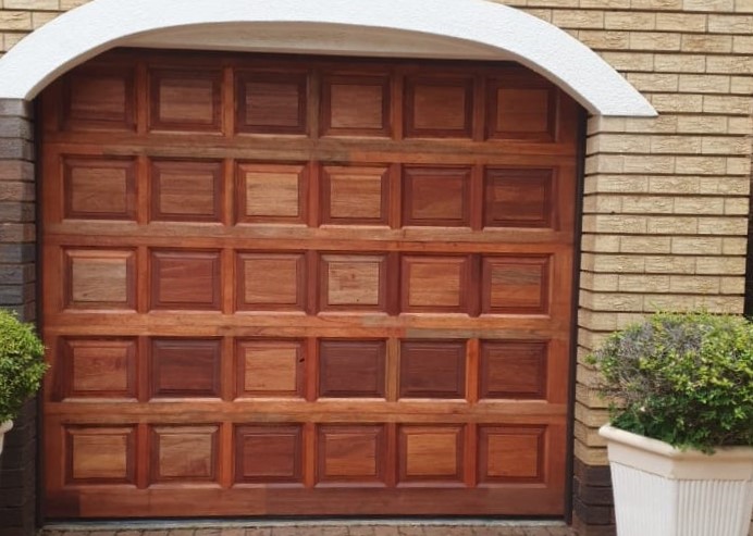 Single Wooden Offset Panel Door - Beautifully crafted with distinctive paneling.